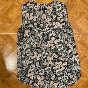 Floral Button down sleeveless shirt.